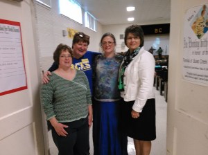 With a couple of parent workers, (left) and the principal, (right). 